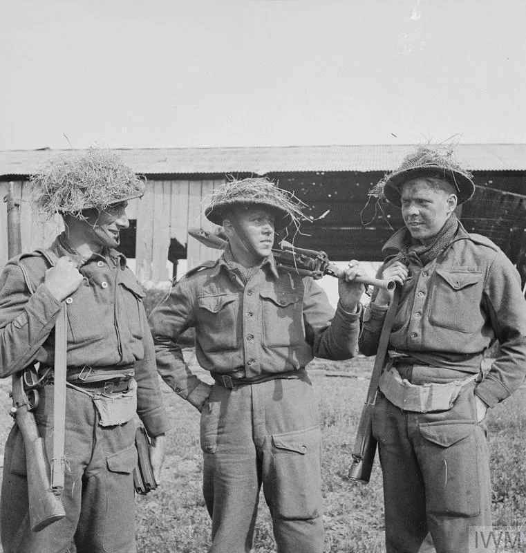 Men of the 1/5th Welch Regiment engaged on sniper-clearing duties, 10 August 1944. Left to right: Pte G Wyatt; Pte R J Wilkes; Pte J C Kershaw.© IWM (B 8978)