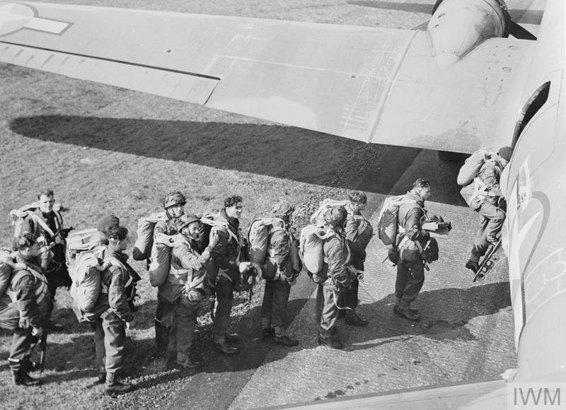British paratroopers line up to board the C-47 transport aircraft.
