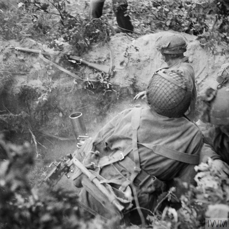 3-inch mortar team of No.23 Mortar (Handcarts) Platoon of Support Company, 1st Border Regiment, 1st Airborne Division, in action in the Oosterbeek perimeter, 21 September 1944.