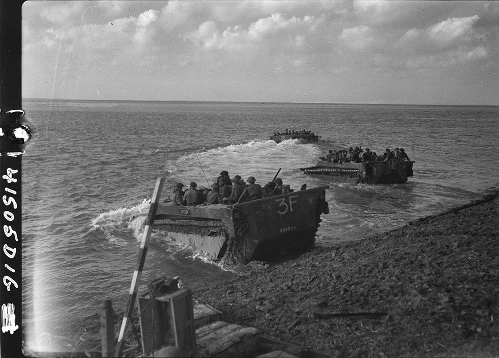 Buffalo amphibious vehicles ferrying soldiers across the Scheldt River towards Hooftplaat