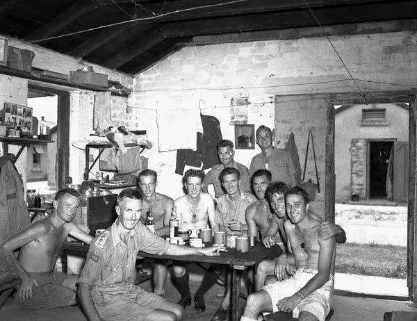 Naval personnel visiting liberated POWs at Shamshuipo Camp, September 1945