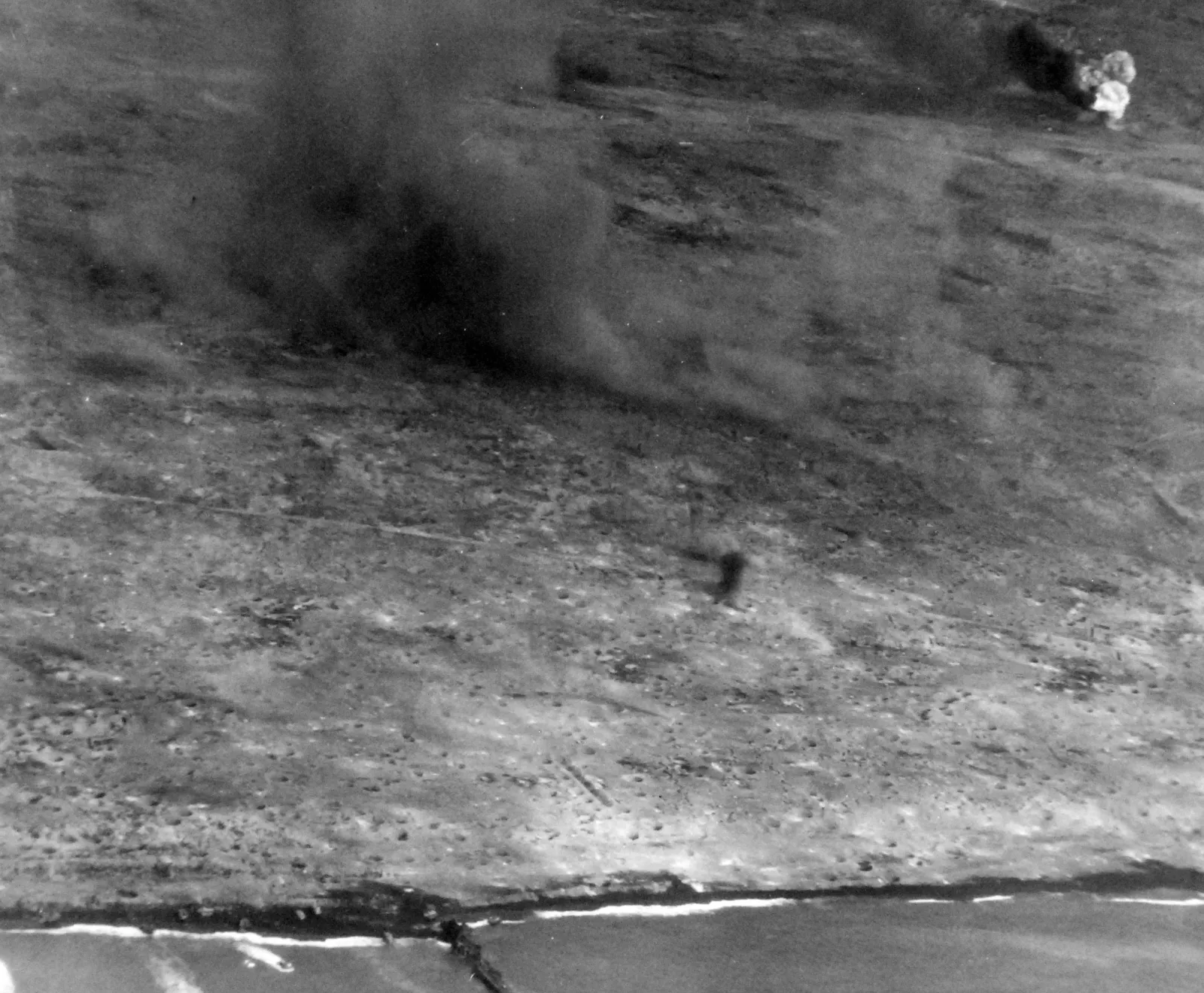 Bomb and shell fire craters strewn across Iwo Jima