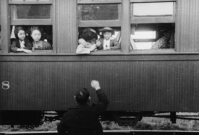 Japanese-Canadians being relocated to camps in the interior of British Columbia