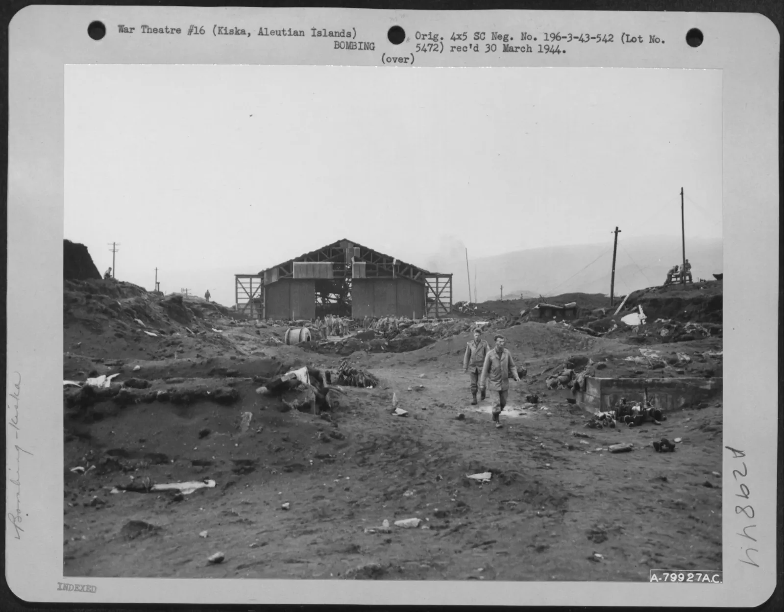 Troops searching abandoned Japanese positions on Kiska