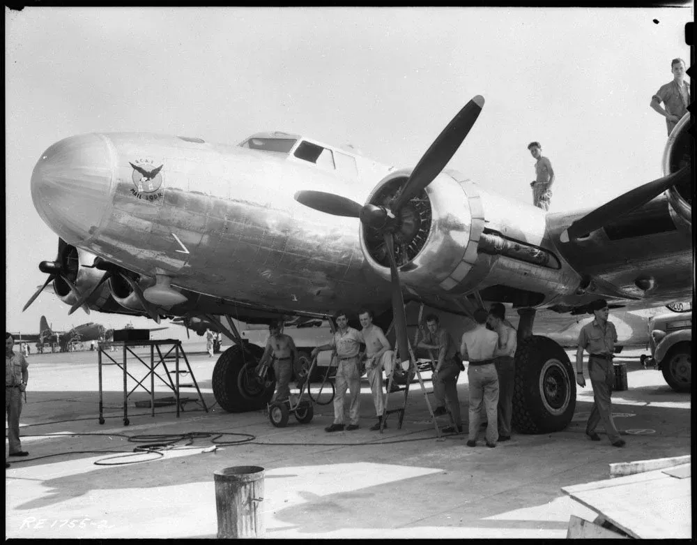 Unidentified personnel with Boeing Fortress IIA aircraft 9205 of No. 168(HT) Squadron, RCAF, Rockcliffe, Ontario, 8 August 1944