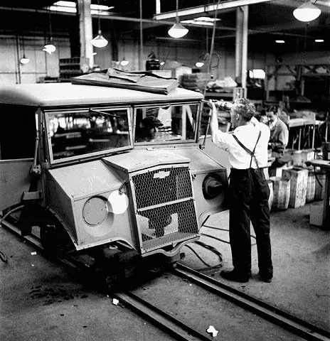 Workman assembling an army vehicle at the General Motors plant in Oshawa
