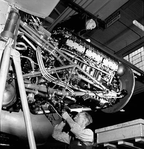 Crowd assembled on the production floor of Canadian Car and Foundry Ltd. producing the Curtiss SB2C-1 Helldiver aircraft