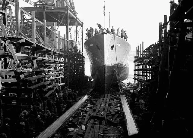 HMCS Toronto sliding down the ways at Davie Shipyard during her launch ceremony on Ships for Victory day