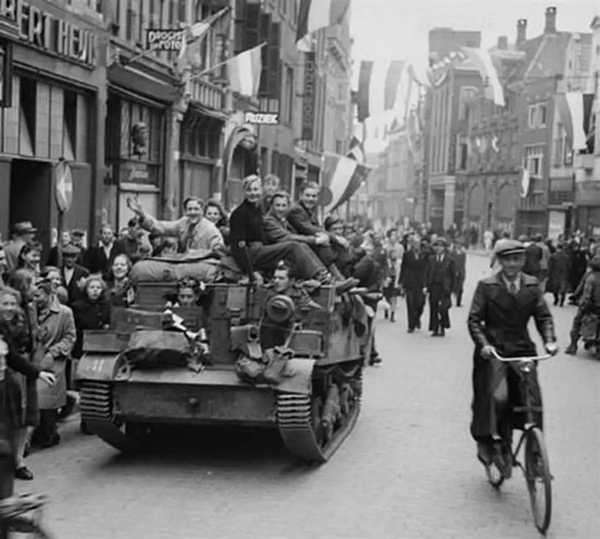 Canadian soldiers greeted by Dutch civilians during the liberation of the Netherlands, 1945