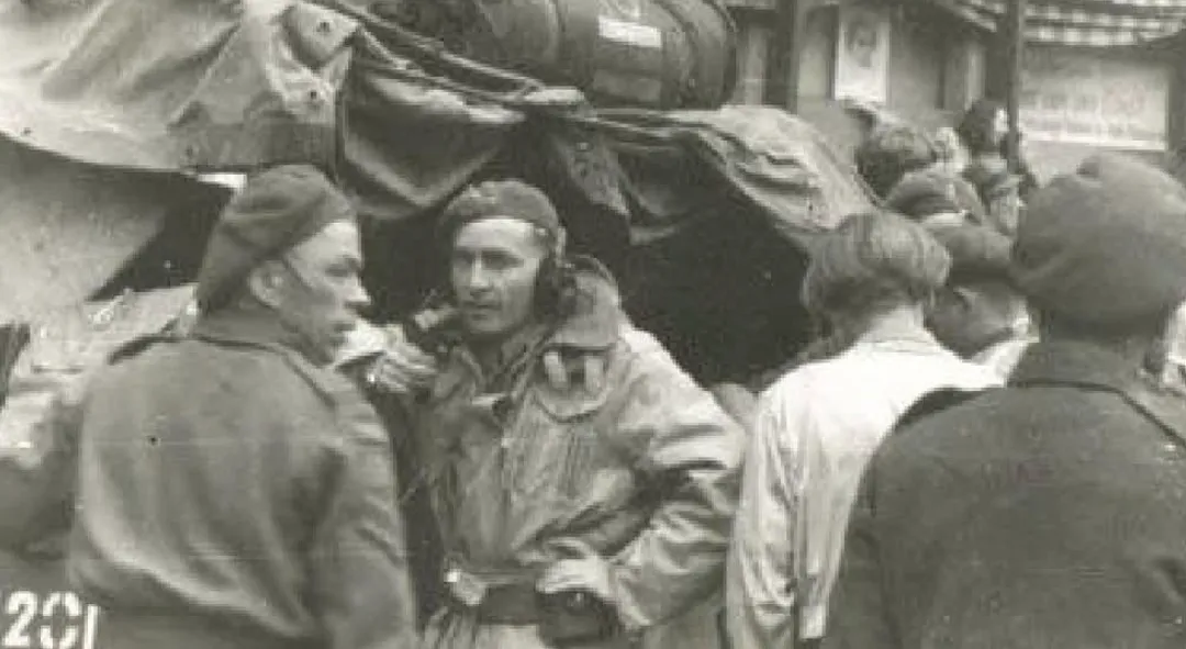 Earl Olmsted outside Zwolle, April 1945. The field where the guns were laid.